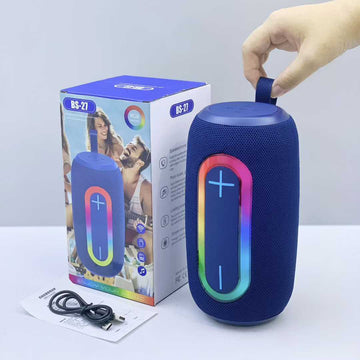 BS-27, featuring a prominent vertical RGB lighting strip down the front face with central plus and minus volume controls.
